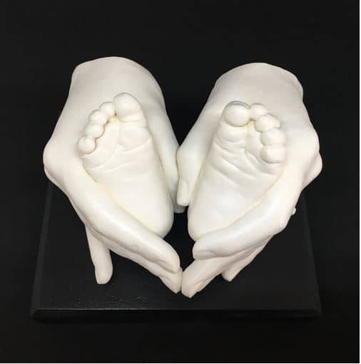 adult and baby feet 3d cast handclasp