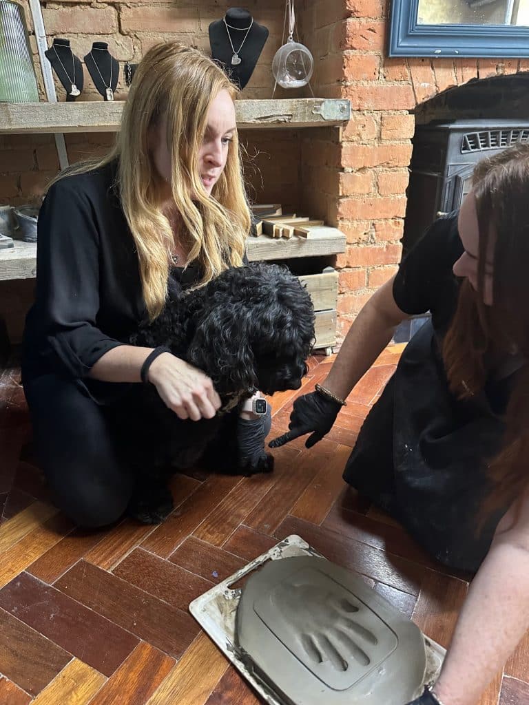 Victoria and Gael capturing a dog paw imprint during Precious Memories keepsake training courses UK – silver jewellery and raised tiles