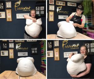 Katy from Buttercup Therapies creating a belly bump cast during training with Precious Memories, student holding the cast, Dorset, UK