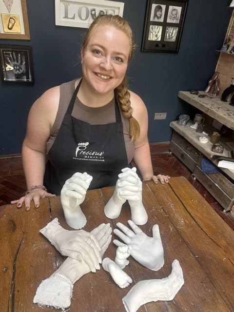 Student on her life casting course in Dorset, with her finished piece