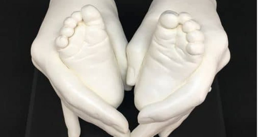 adult and baby feet 3d cast handclasp